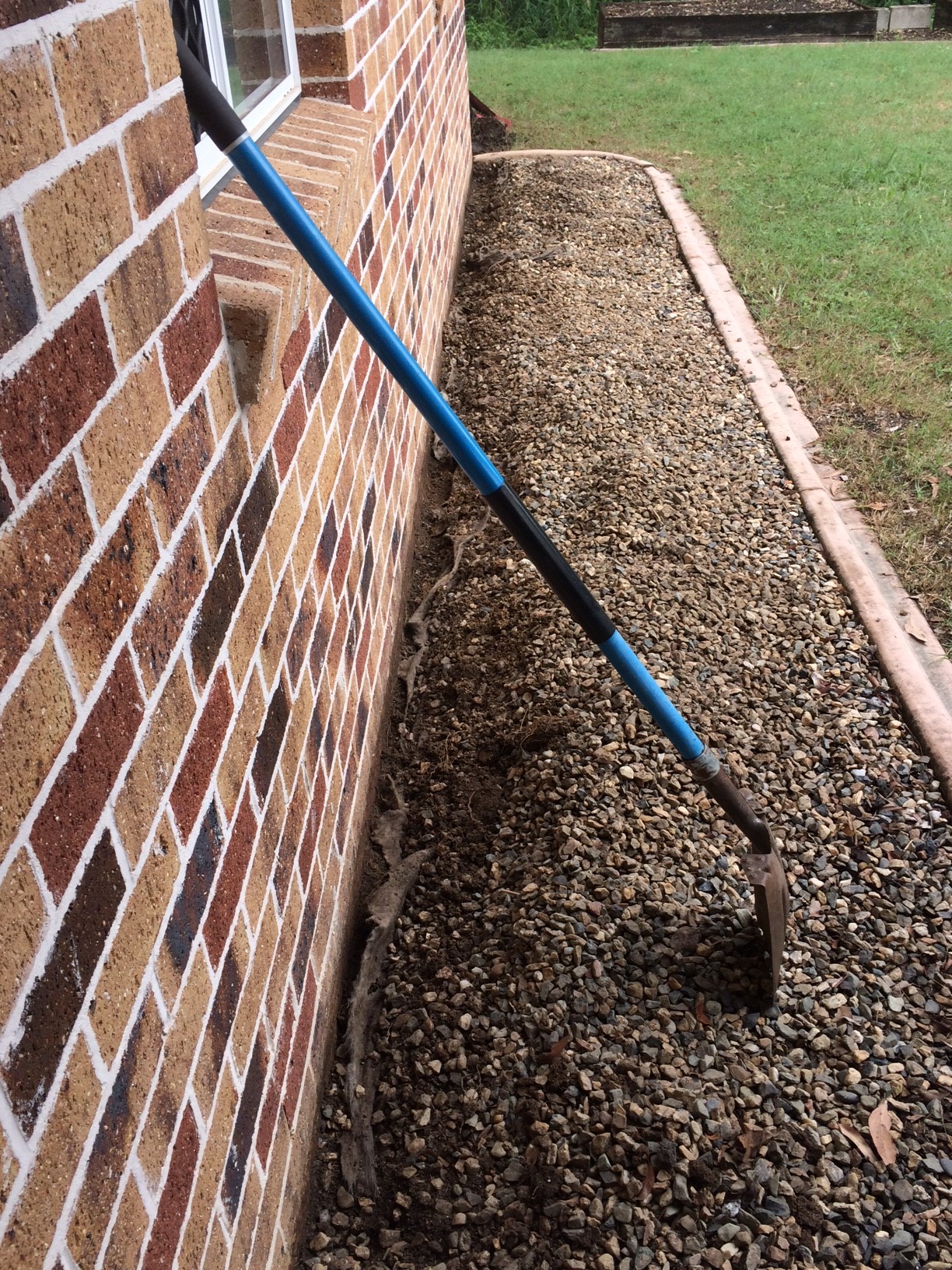 Digging down to the footing of the external perimeter of a home.