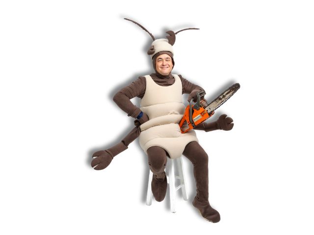 Nick Wood in a termite costume holding a chainsaw
