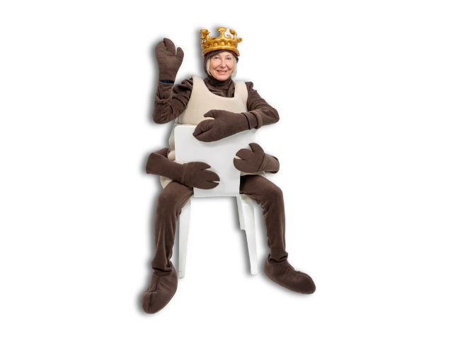 Steph on a chair in a termite costume