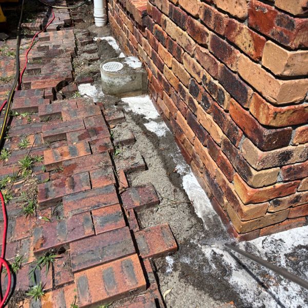 Applying Termidor under pavers